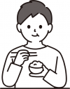 ごはんを食べる男性
